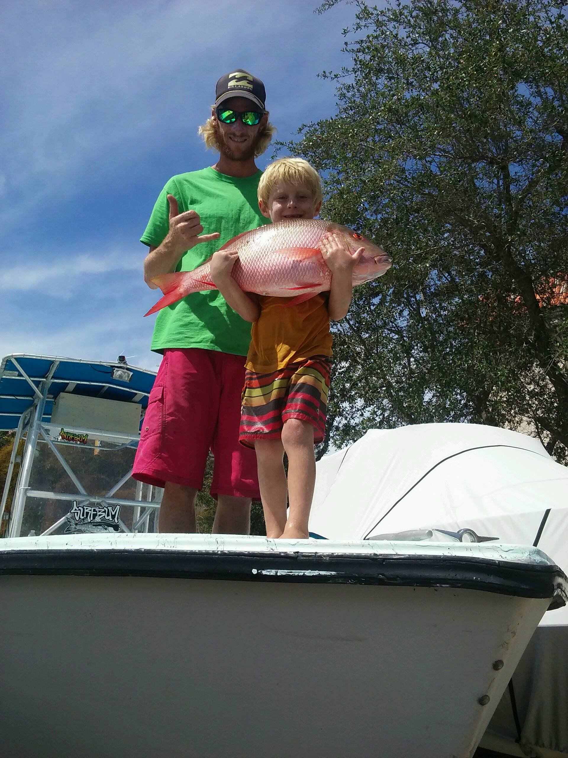 little boys peeing boat 